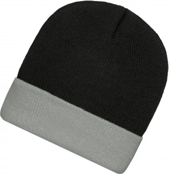 Klassikaline kootud müts kontrastse äärega